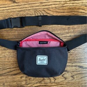 Hershel Black Crossbody Waist Bag with Red Lining